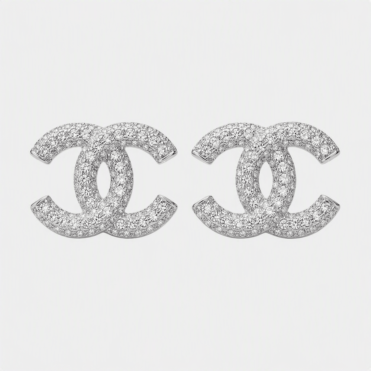 Interlocking Letter Earrings Crystal In Silver Tone