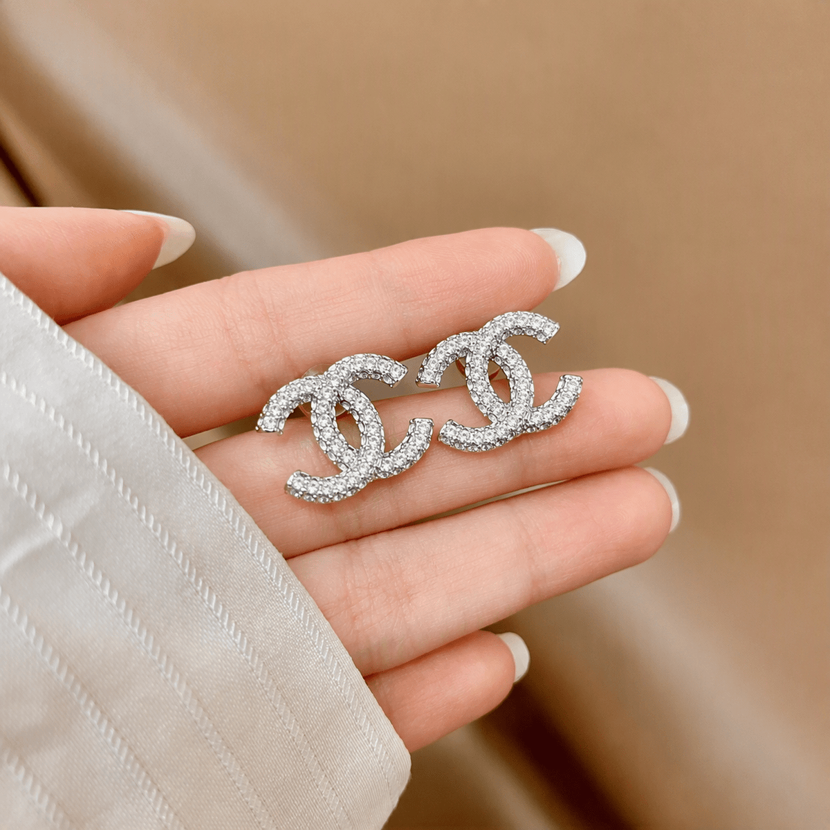 Interlocking Letter Earrings Crystal In Silver Tone
